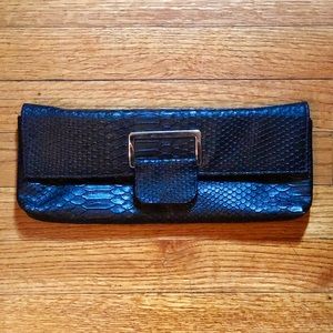 Snake print clutch